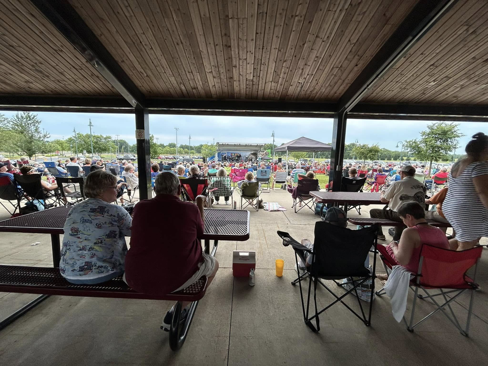 picture of crowd enjoying music in the park concert outside at Blue River memorial park