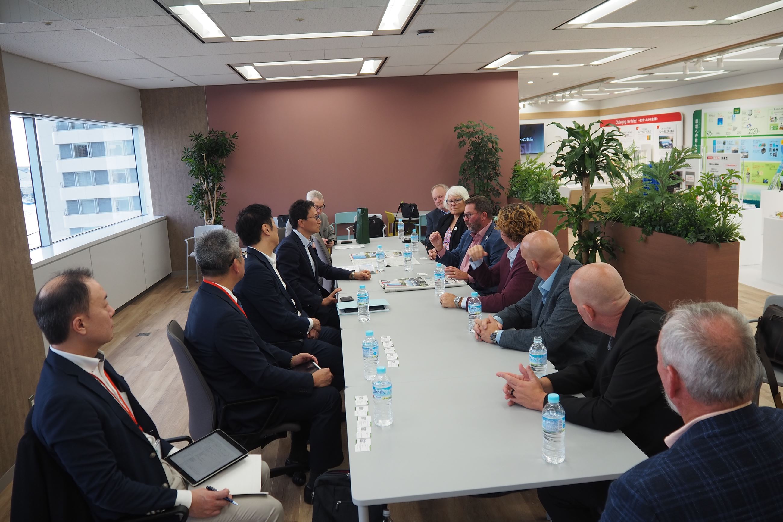 RISU Japanese leadership and City Officials at boardroom table
