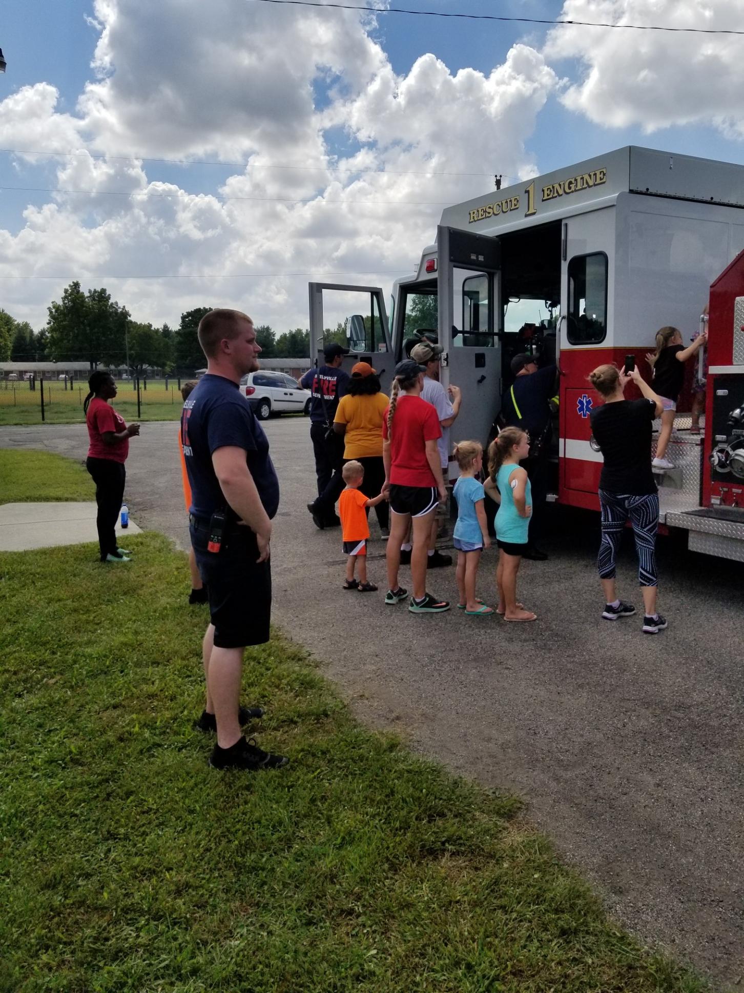 Families Exploring Fire Truck